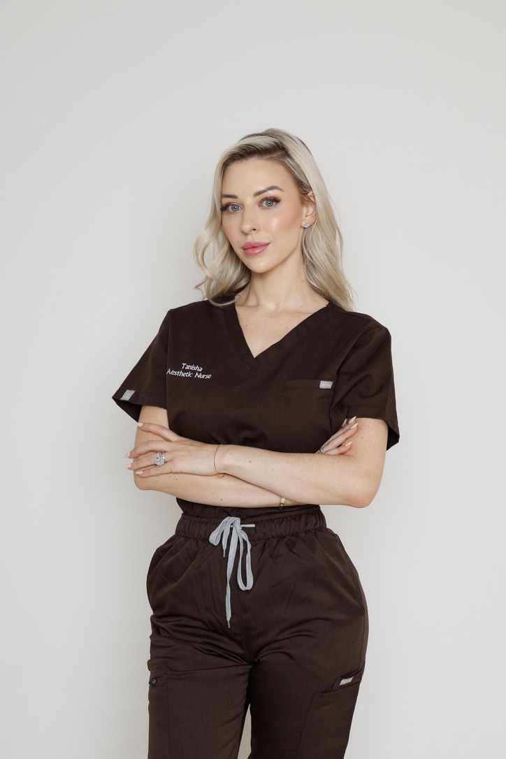 Tanisha, Academy founder, in clinic uniform