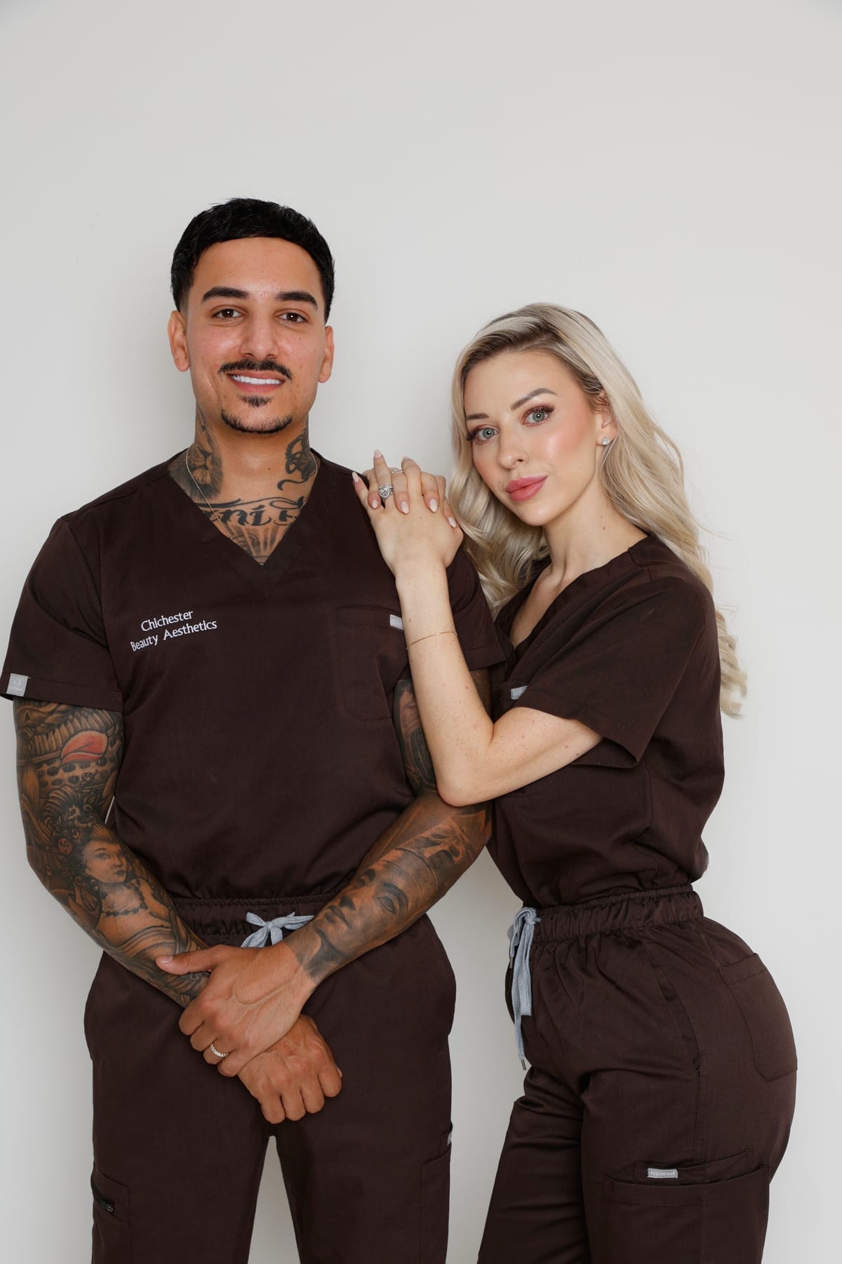 Michael and Tanisha, Academy educators, in Chichester Beauty Aesthetics scrubs